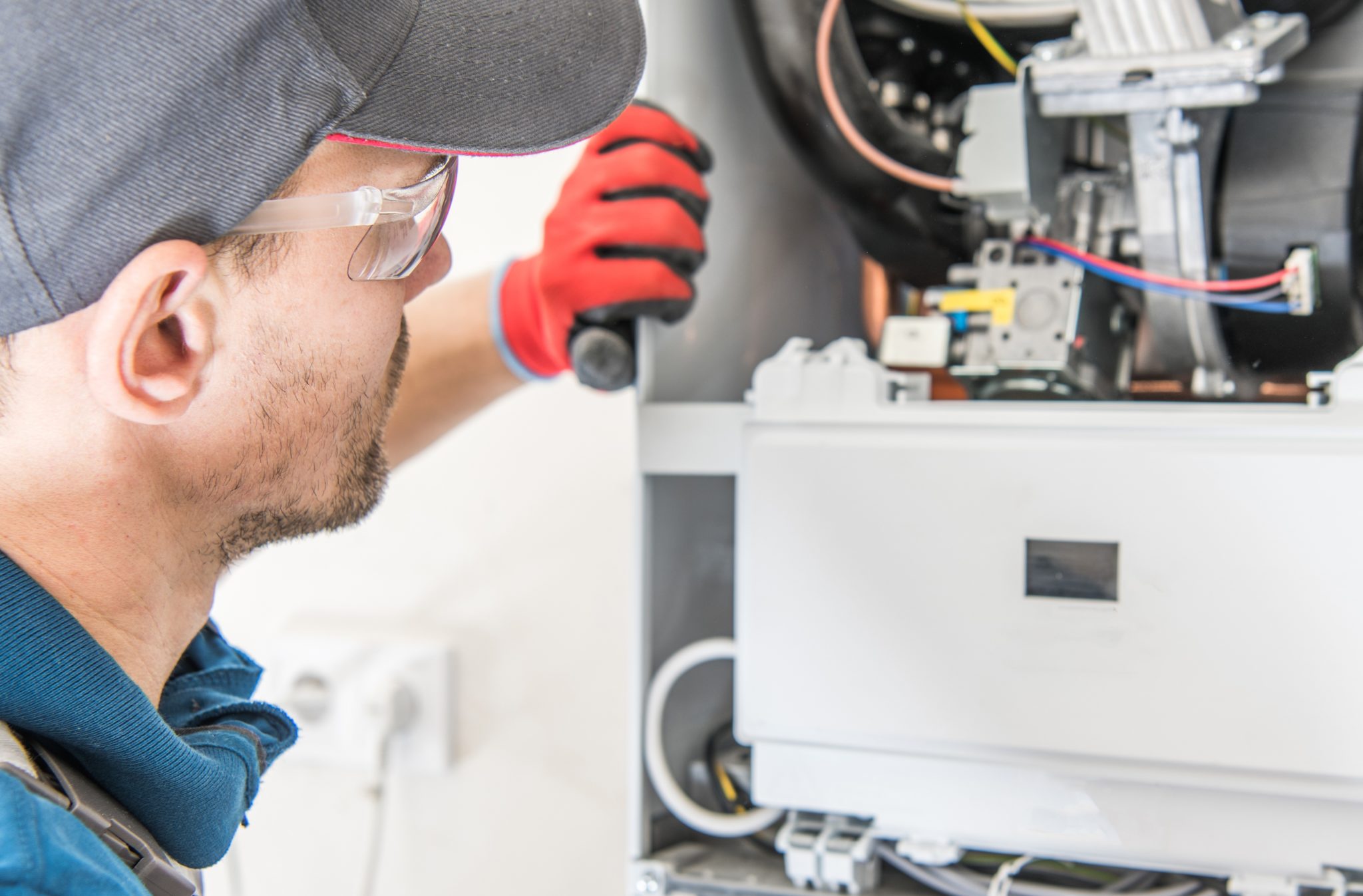 Technician working on a gas burner