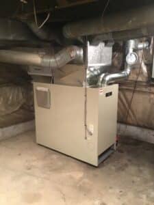 Thermopride fuel oil furnace in a basement