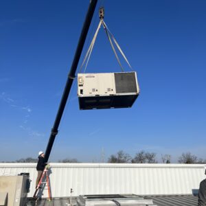 crane removing old lennox rtu commercial hvac unit from a church building