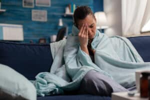 Woman with CO Poisoning Symptoms Headache